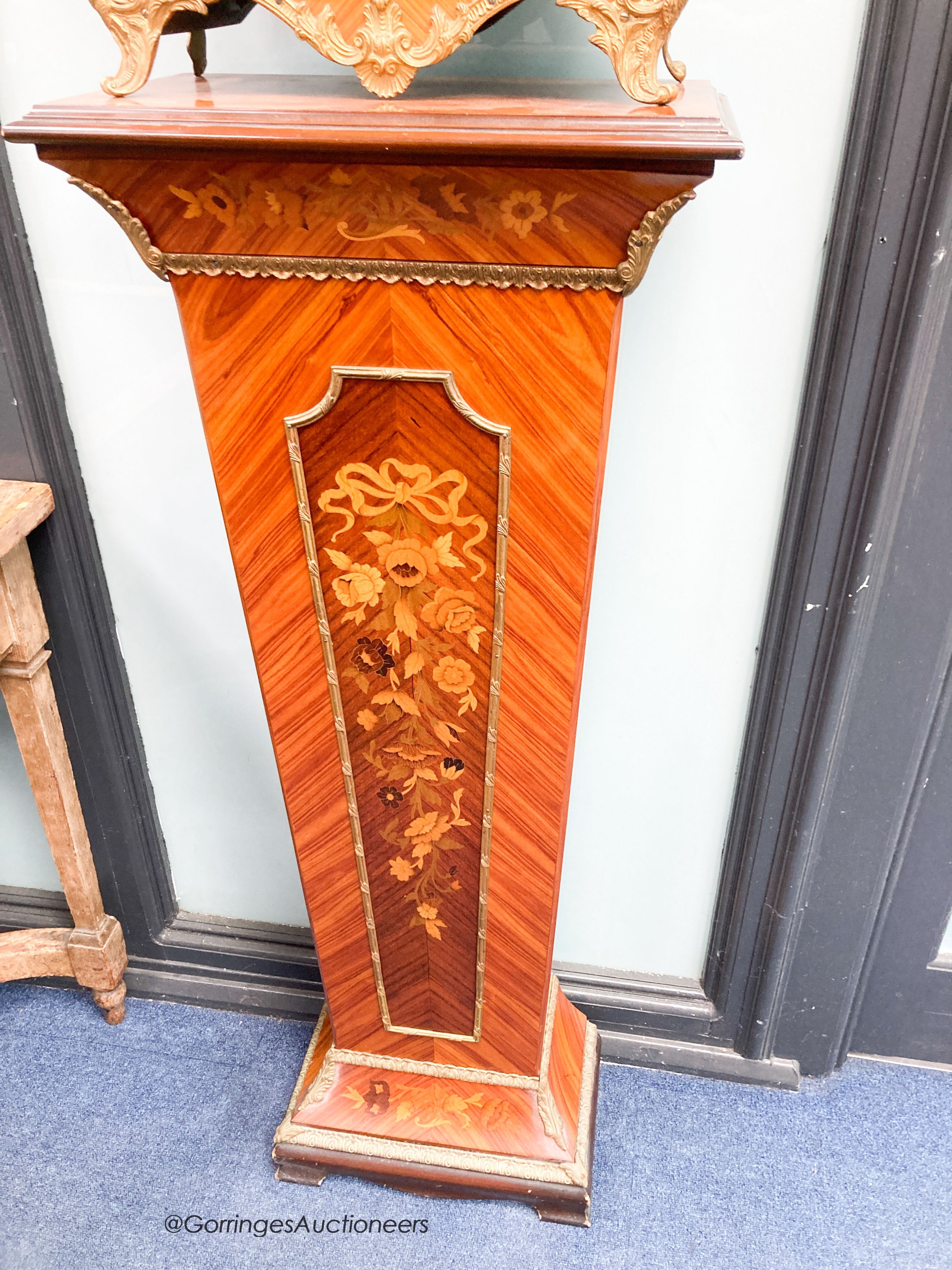 A reproduction Louis XVI style inlaid kingwood bracket clock with matching pedestal, height 190cm